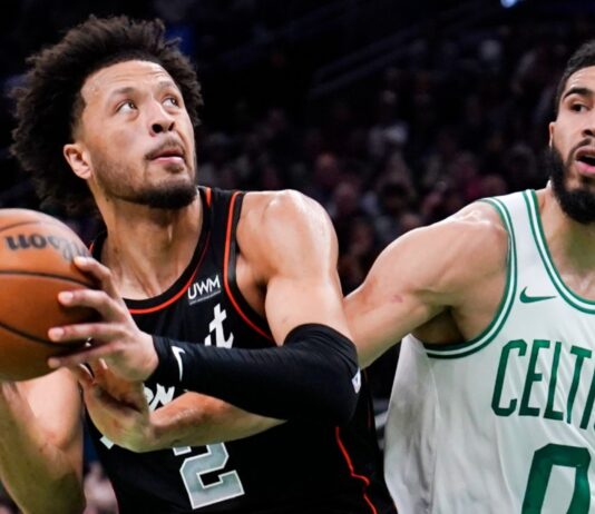 Detroit-Pistons-guard-Cade-Cunningham-2-drives-to-the-basket-against-Boston-Celtics-Jayson-Tatum NBA